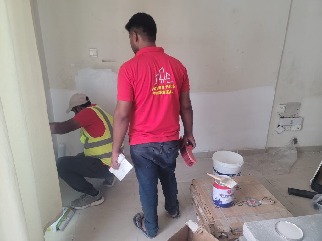 Workers from Fast Fix Experts Doing Paint Seepage Repair Renovation work in Dubai Marina